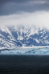 Cruise to Hubbard Glacier Bay in Alaska with floating ice bergs and drift ice floes on ocean water...