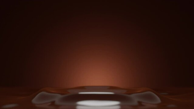 Liquid chocolate drop falling in slow motion. Crown splash macro. Sweet brown abstract background