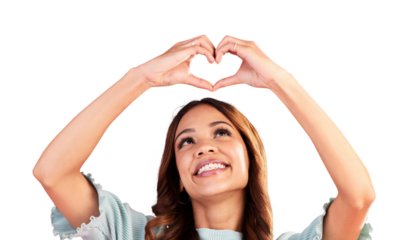 Happy, face and heart with hands of woman for care, kindness or charity donation isolated on transparent png background. Female model smile with finger, love sign and icon of like, emoji or thank you