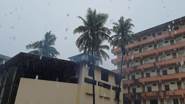 A Beautiful View Of Rain Falling Over The Big Lodging Building At Holy Place