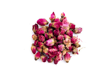 Dried roses for tea on white background.