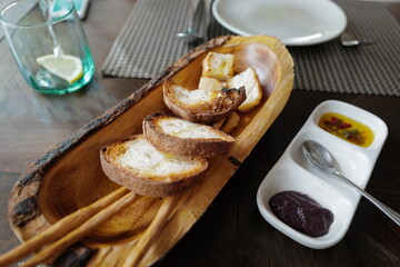 Close up wooden bowl of bread basket