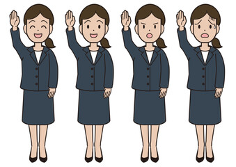 A young woman in a suit raising her hand