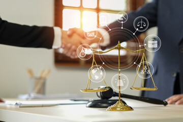 judge on wooden table And experienced lawyers meet with clients and give advice behind the scenes. legal services legal consulting concept