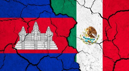 Flags of Cambodia and Mexico on cracked surface - politics, relationship concept