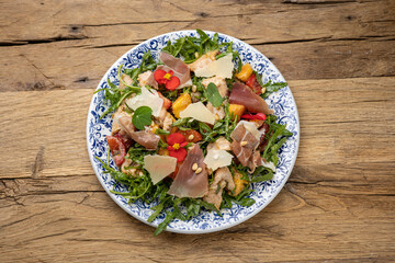 A delicious salad in a restaurant. Close-up