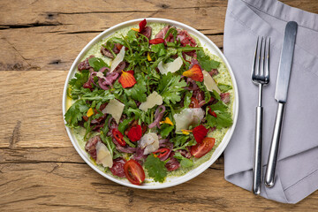 A delicious salad in a restaurant. Close-up
