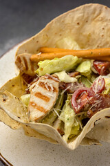 A delicious salad in a restaurant. Close-up