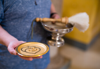 close-up of wedding rings in the church at the wedding ceremony