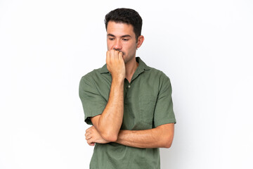 Young handsome man over isolated white background having doubts