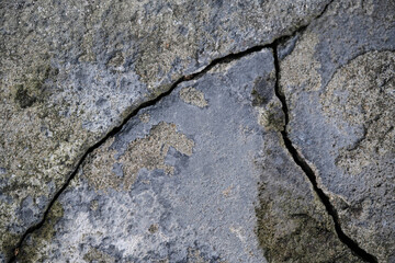 close up texture of cracked plaster on the wall