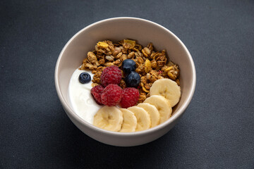 a delicious breakfast. Oatmeal with berries. Close-up