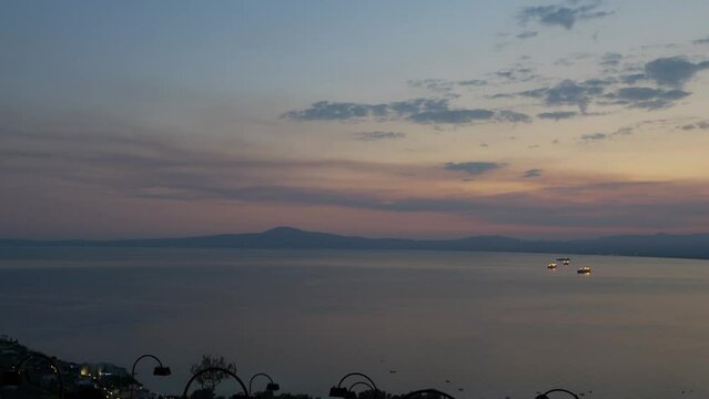 Top view from mountain on evening seaside coastline in Kalamata, Greece. 