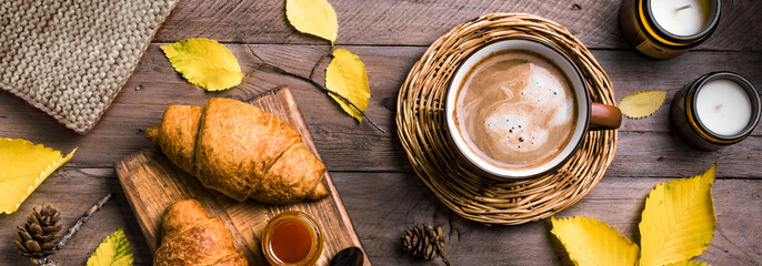 Autumn composition - coffee and croissants - obrazy, fototapety, plakaty