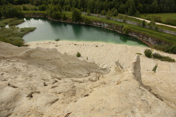 Hills of white limestone sand in the former Estonian prison of Rummu