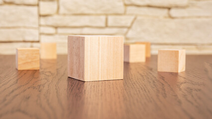wooden blocks on wooden table, close up. space for text