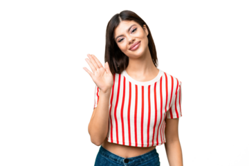 Young Russian woman over isolated chroma key background saluting with hand with happy expression