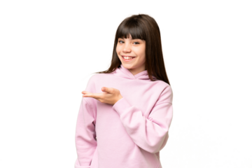 Little girl over isolated green chroma key background presenting an idea while looking smiling towards