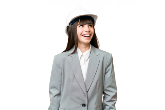 Little girl playing as a architect with helmet and holding blueprints over isolated background thinking an idea while looking up