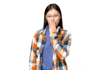 Young Asian woman over isolated chroma key background covering mouth with hand