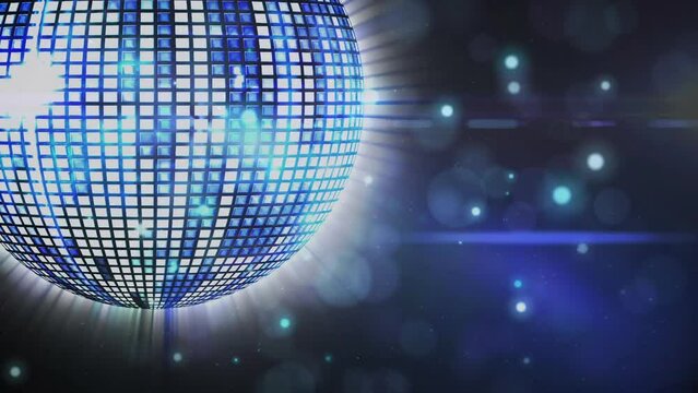 Animation of spinning mirror disco ball over blue background