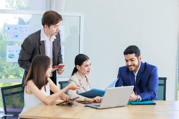 Millennial Asian Indian multinational professional successful businessmen and businesswomen in...