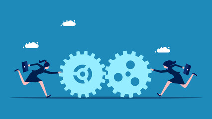 Work together. Two businesswomen pushing gears towards each other. vector