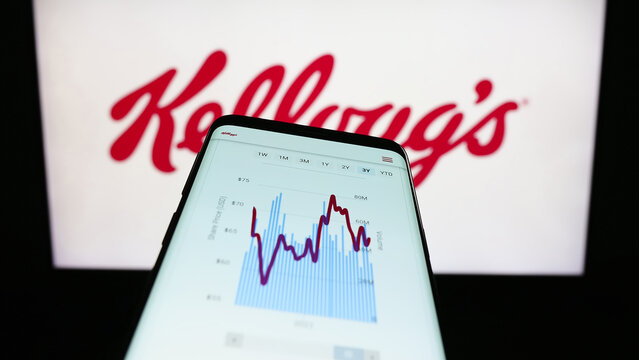 Stuttgart, Germany - 07-29-2023: Smartphone with webpage of US business The Kellogg Company (Kellogg's) on screen in front of business logo. Focus on top-left of phone display.
