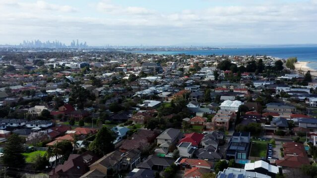 AERIAL Over Melbourne Western Suburb Of Altona With Port Phillip Bay