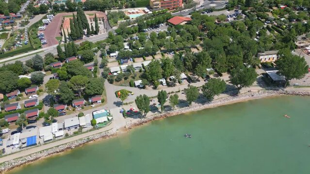 Aerial Shot of Camping Cisano San Vito Beside Lake Garda, Italy. 4K Drone