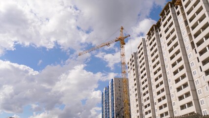 The crane is working during the construction of a multi-storey building.