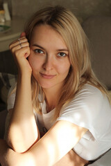 Fototapeta premium Portrait of blond beautiful woman. close-up. golden light.