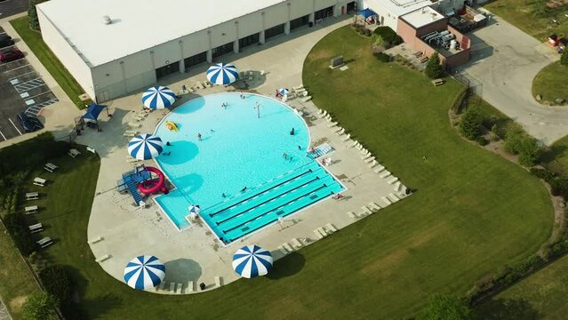 Aerial footage of the Benjamin Harrison YMCA public pool in Lawrence, Indiana.
