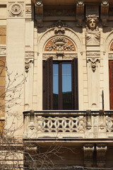 An old window in an old building in Catania, Italy 
