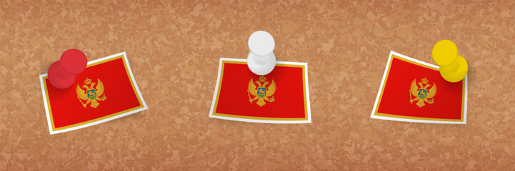 Montenegro flag pinned in cork board, three versions of Montenegro flag.