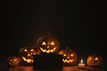 Halloween pumpkins with candles on table in dark room. Space for text