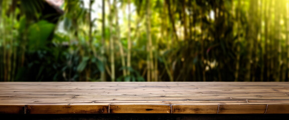 Empty rustic old wooden boards table copy space with bamboo plants forest in background. Product...