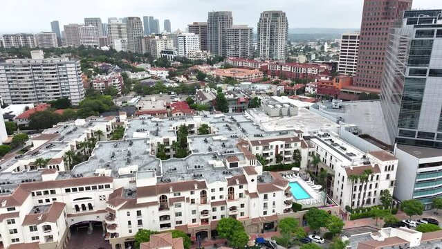 Aerial view over Westwood neighborhood buildings, Los Angeles California