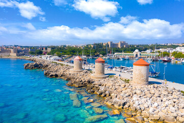 Mandraki port with fort of St. Nicholas and windmills, Rhodes, Greece.  - obrazy, fototapety, plakaty