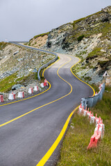 Dangerous, winding mountain road Transalpina in Romania. One of the most beautiful asphalt road in...