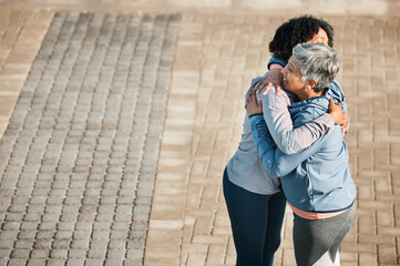 Running, hug and women with mockup space, love and care for fitness and exercise. Athlete, wellness and female friends on a promenade with motivation, greeting embrace and smile from runner target