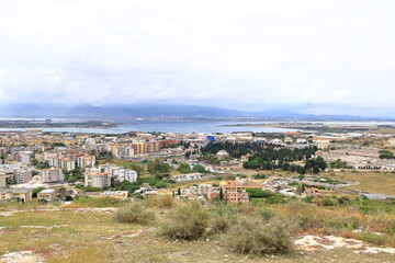 Fototapeta na wymiar Panoramic view over the city of Cagliari, capital of Sardinia, Italy; view from Parco di San Michele