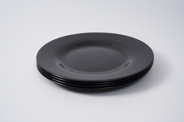 black ceramic plates on white background