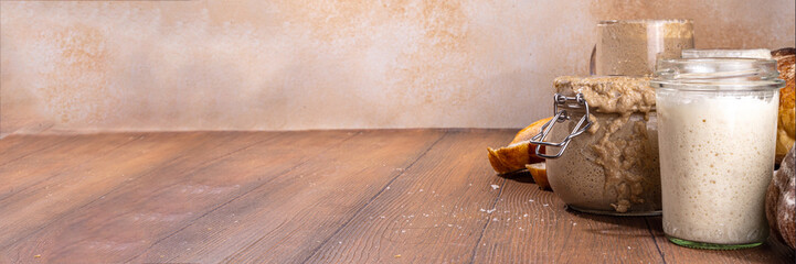 Active homemade sourdough in jars