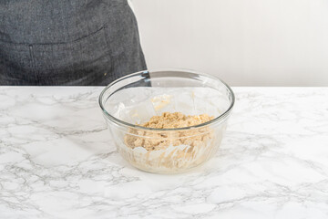 Lemon poppy seed muffins garnished with almond slivers