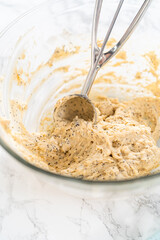 Lemon poppy seed muffins garnished with almond slivers