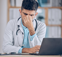 Man, doctor and headache with laptop in stress, mistake or debt from burnout or deadline at...
