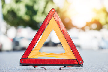 Red triangle, road sign and stop for emergency, construction or symbol for caution to driver on the...