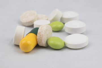 Colored tablets - medicines for the treatment of various diseases - medication addiction