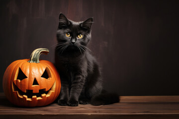 Halloween black cat with pumpkins on wooden table, dark background and space for text.
